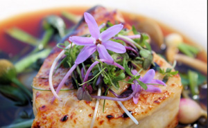Chilean Sea Bass, Asian consume, Floating veggies with Garlic Flowers